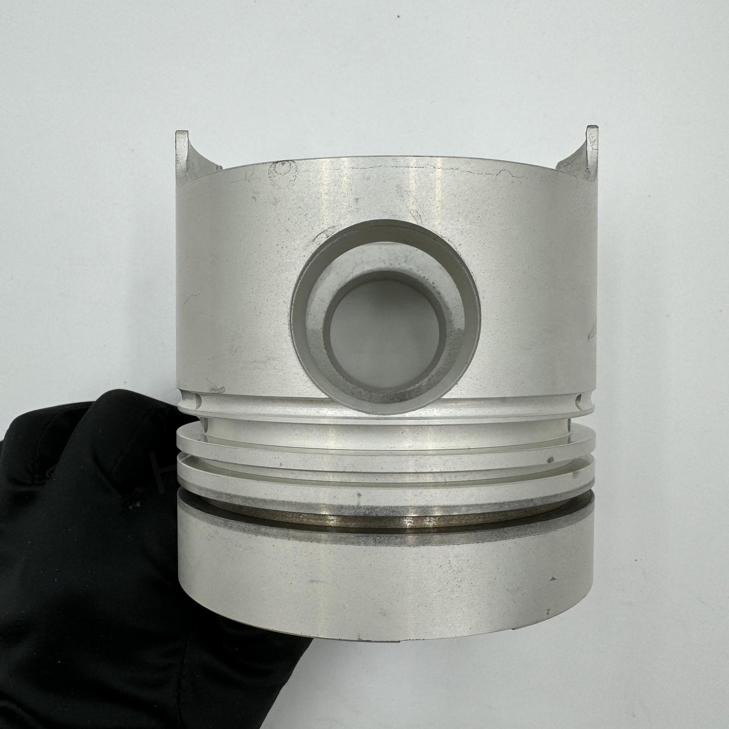 1121112401 PISTON