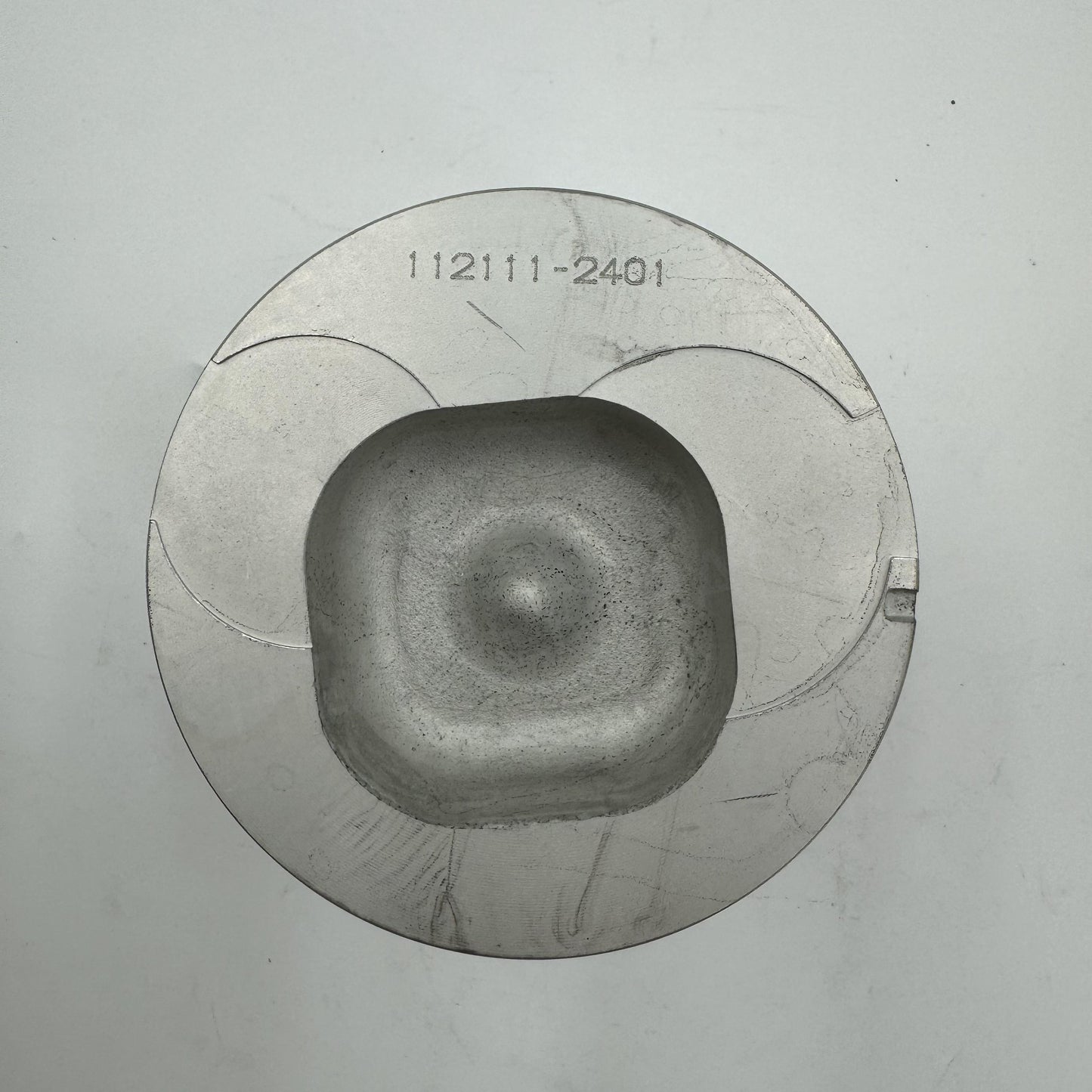 1121112401 PISTON